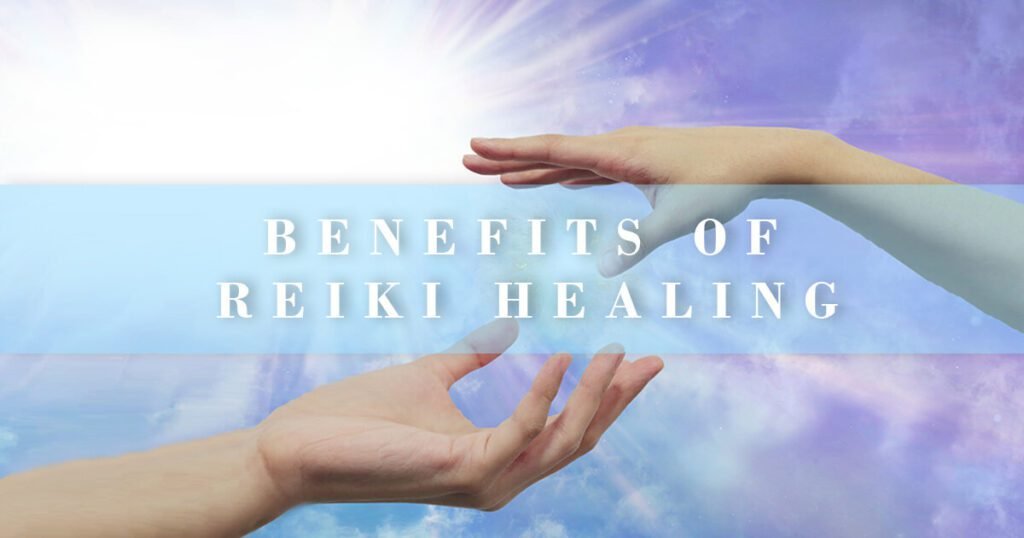 benefits of reiki energy -hands close to touching each other over a dream-like wallpaper