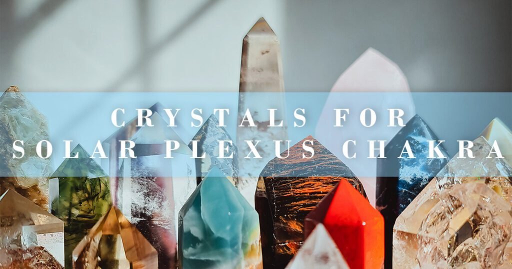 unblock and heal the solar plexus chakra crystals - many pointed standing up straight crystals with text overlay